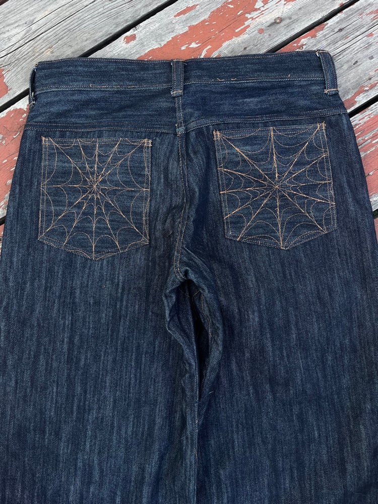 Image of denim web jeans