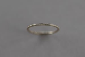 Image of 9ct yellow gold thin milled ring