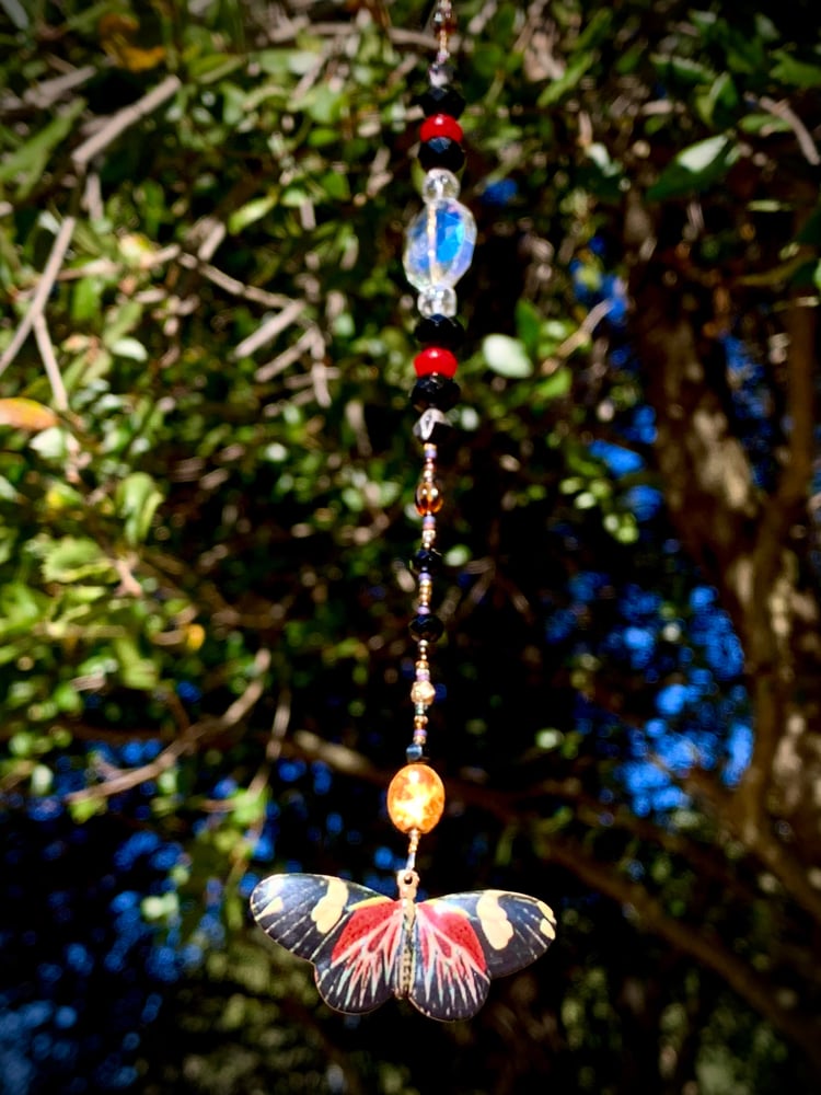 Image of “Colorful Moth” Sun Catcher
