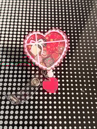 Image 2 of chocolate box badge reel 