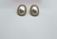 Gold trim pearl stud