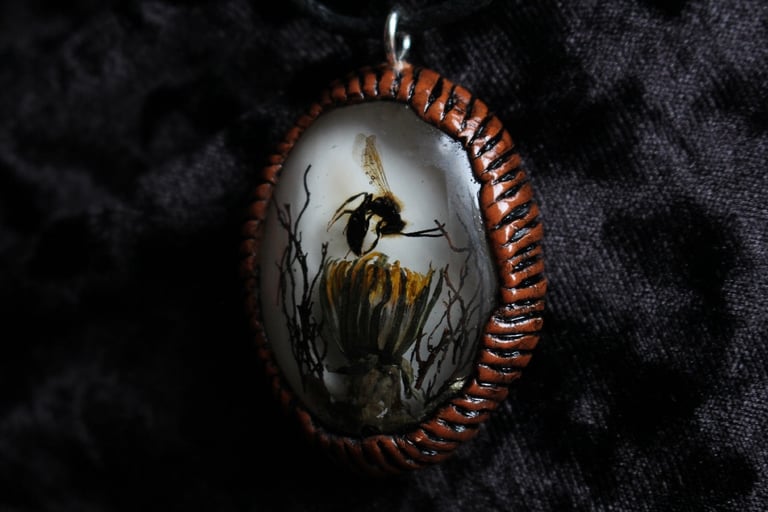 dead good dandelion and insect necklace