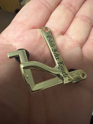 Image of 2” Brass 75th Anniv. Tahiti Felix Jonesy Pin