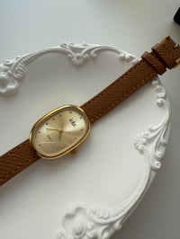 Image 1 of Sophias timepiece 