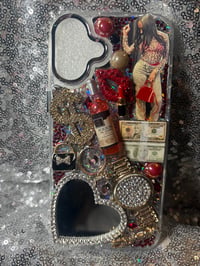Image 1 of  My goddaughter Zizi Standing on money,💵 stacks iPhone case comes with a free mini keychain