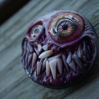 Image 13 of Custom Swappable Phone Grip for smartphones, reflective pupil, glow in the dark. Madballz