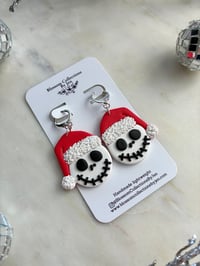 Image 2 of skeleton with Santas hat