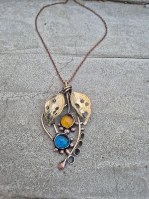 Blue and yellow bullet cussings necklace 