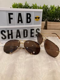 Image 1 of Brown on gold Porshe designs