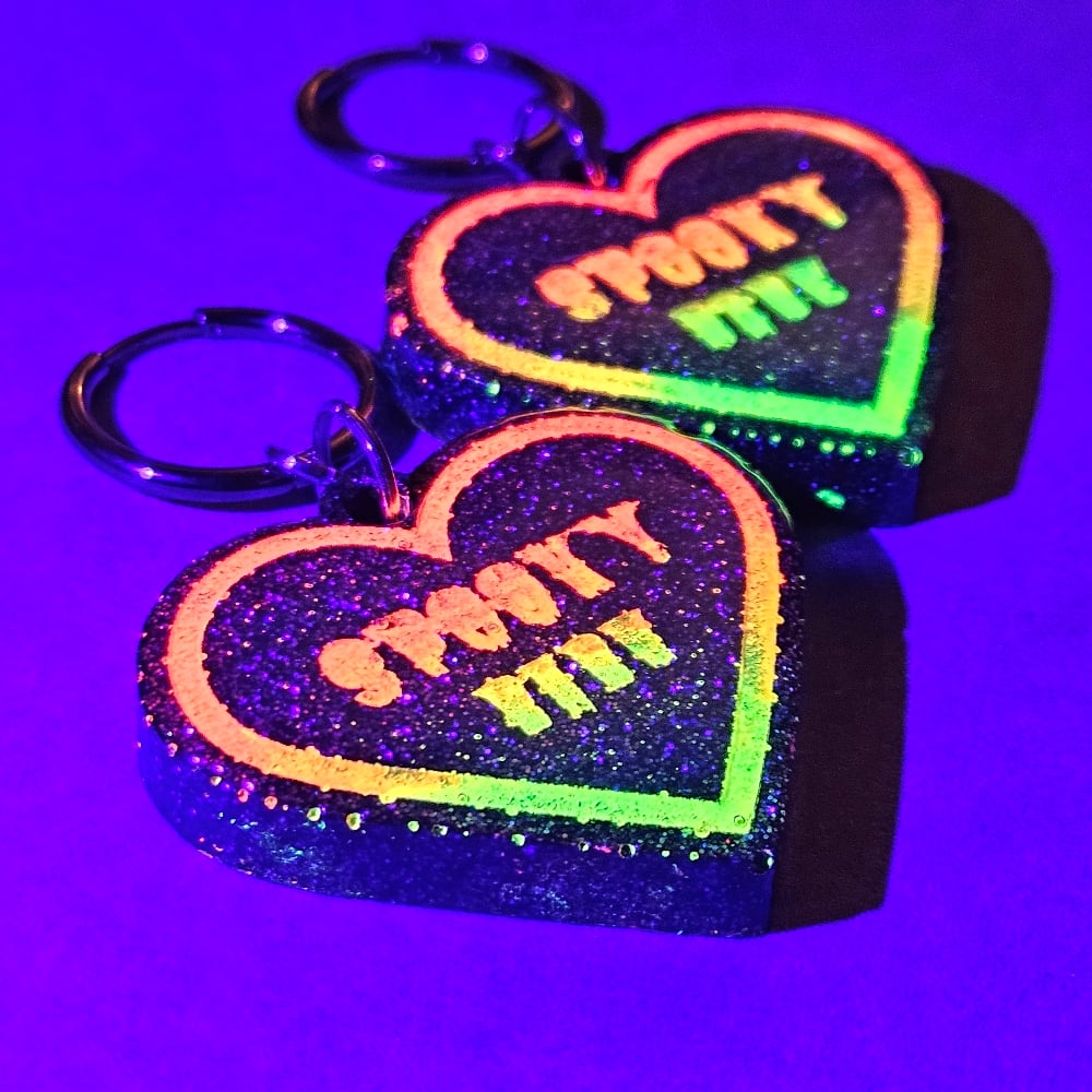 Image of Spooky Babe Heart Earrings: Black Holo w/ Neon Sunset Ombre Lettering