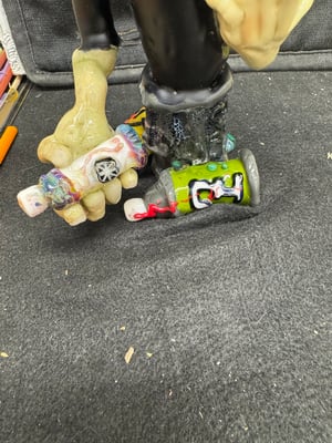 Image of Graf Can Man sculpture by DL