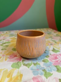 Image 1 of carved peach tumbler