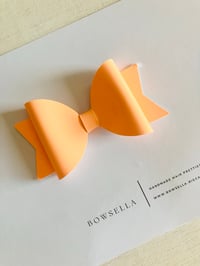 apricot patent bow 