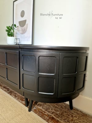Image of Long Curved Nathan Sideboard in Black on Black wooden tapered legs