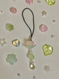 Image 2 of lotus phonecharm
