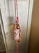 Image of Pink macrame wine bottle holder