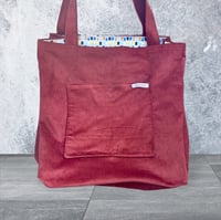 Image 1 of Rust cordoroy tote bag with geometric lining