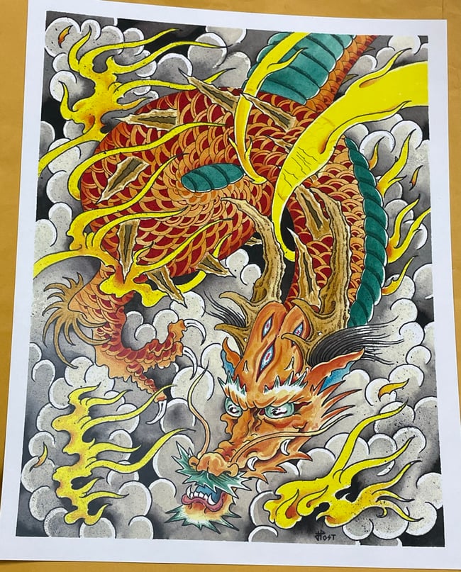 Red dragon with several eyes 
