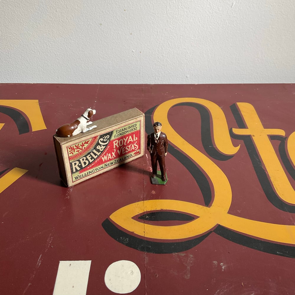 Image of Guy With Pipe,Dog & Matcbox