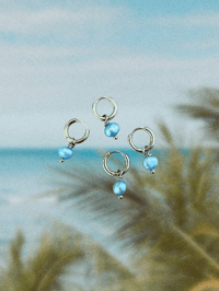 Image 1 of Silver Ocean Blue Pearl Huggies