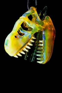 Image 3 of NS yellow T-Rex skull pendant with uv stardust tip and uv reactive teeth 🦖😤