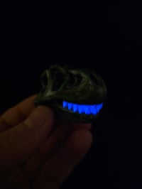 Image 3 of Chromium T-Rex skull pendant with glowin glass glow in the dark teeth.