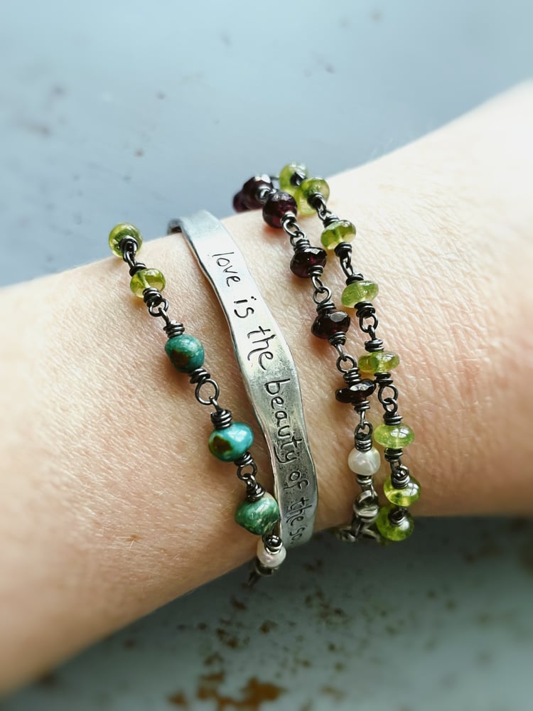 Image of garnet and green turquoise bracelet