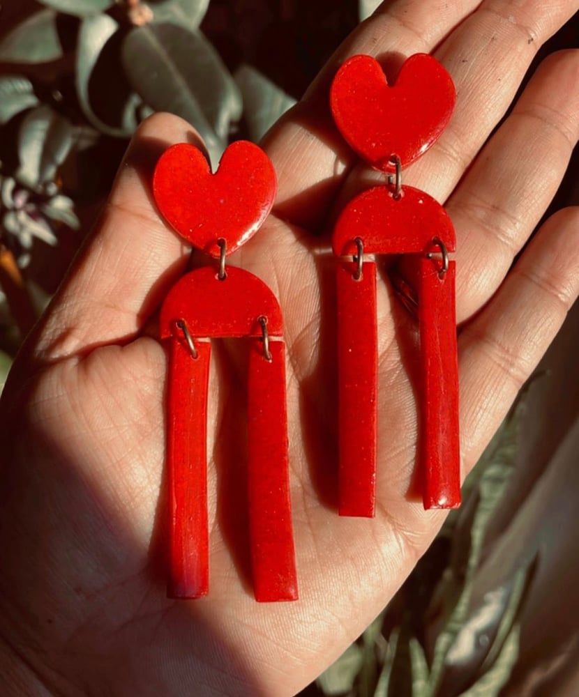 Image of Long sparkly red dangles 