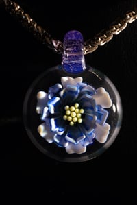 Image 2 of blue daisy flower pendant made by Roe glass. 