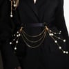 Evening belt decorated with chains and glass beads