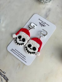 Image 3 of skeleton with Santas hat