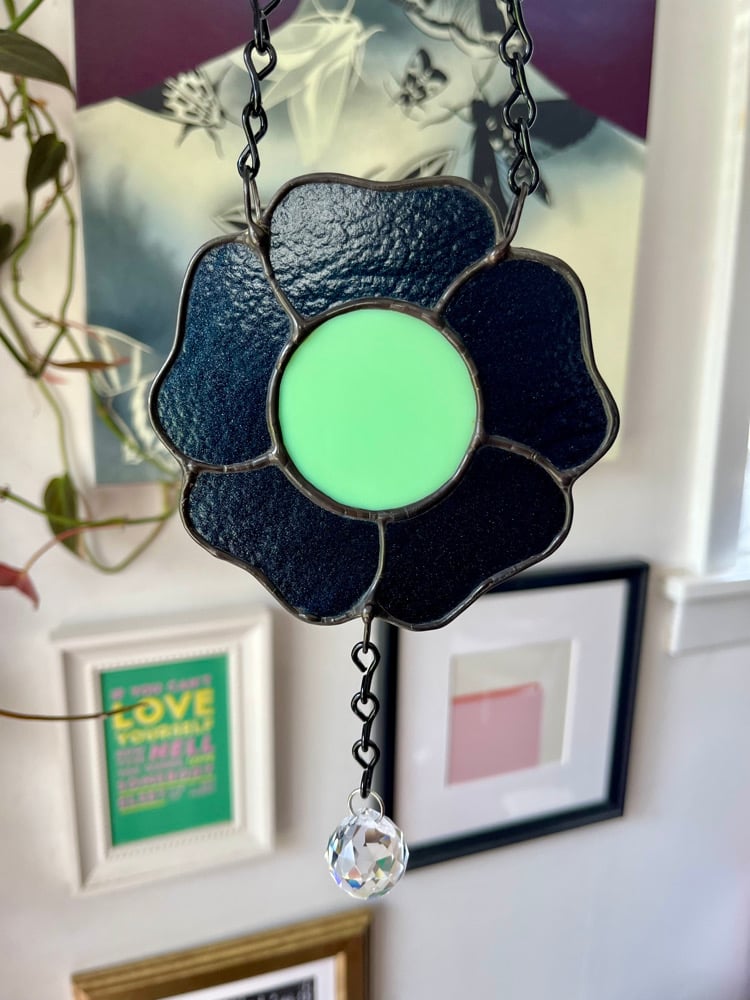 Image of Flower w/ a Dangling Crystal 