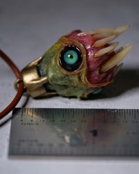Image 2 of Egg of the King all seeing fangs pendant, leather cord, brass hardware, OOAK