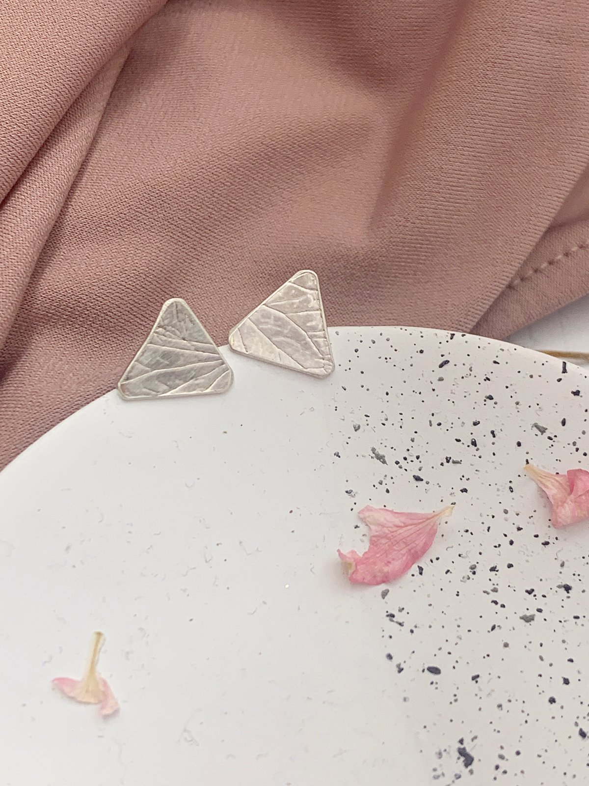 Image of Recycled sterling silver triangle stud earrings with hydrangea petal imprint
