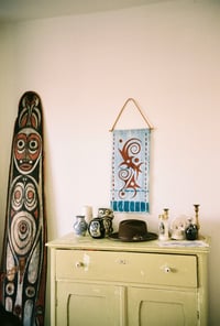 Image 3 of INA II banner