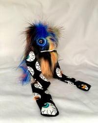 Image 2 of Glow in the dark eye ball Poof