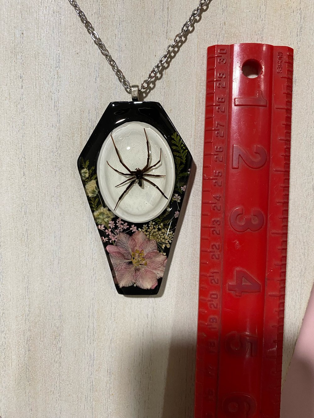 Black widow coffin pendant 