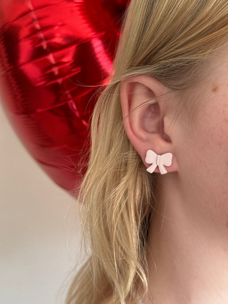 Image of pink mini bow studs 