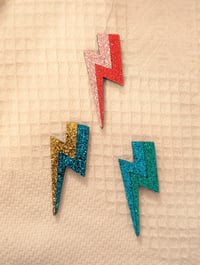 Broche eclair paillettes 