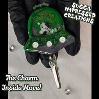 Image 1 of Green Hello Kitty UFO Clip