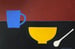 Image of Blue Cup, Yellow Bowl and Spoon