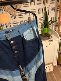 Image 2 of Fashion Nova patch work jeans 