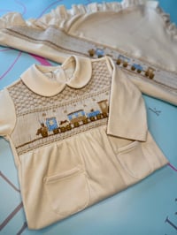 Image 1 of boys tan smocked babygrow
