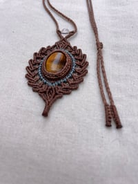 Image 2 of macrame necklace with tigers eye and clear quartz bead