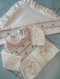 Image 4 of girls multi dot smocked babygrow