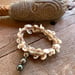 Image of Dainty Hawaiian puka shell wrap bracelet or necklace  with a Tahitian pearls