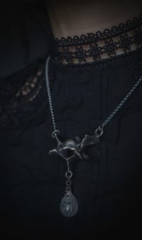 Image 3 of Real vertebrae bone and clear quartz drop necklace
