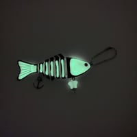 Image 1 of green glow in the dark skeleton fish keychain
