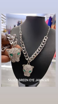 Silver green eye jawn necklace 