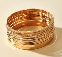 Image 2 of Gold 14pc bangle 